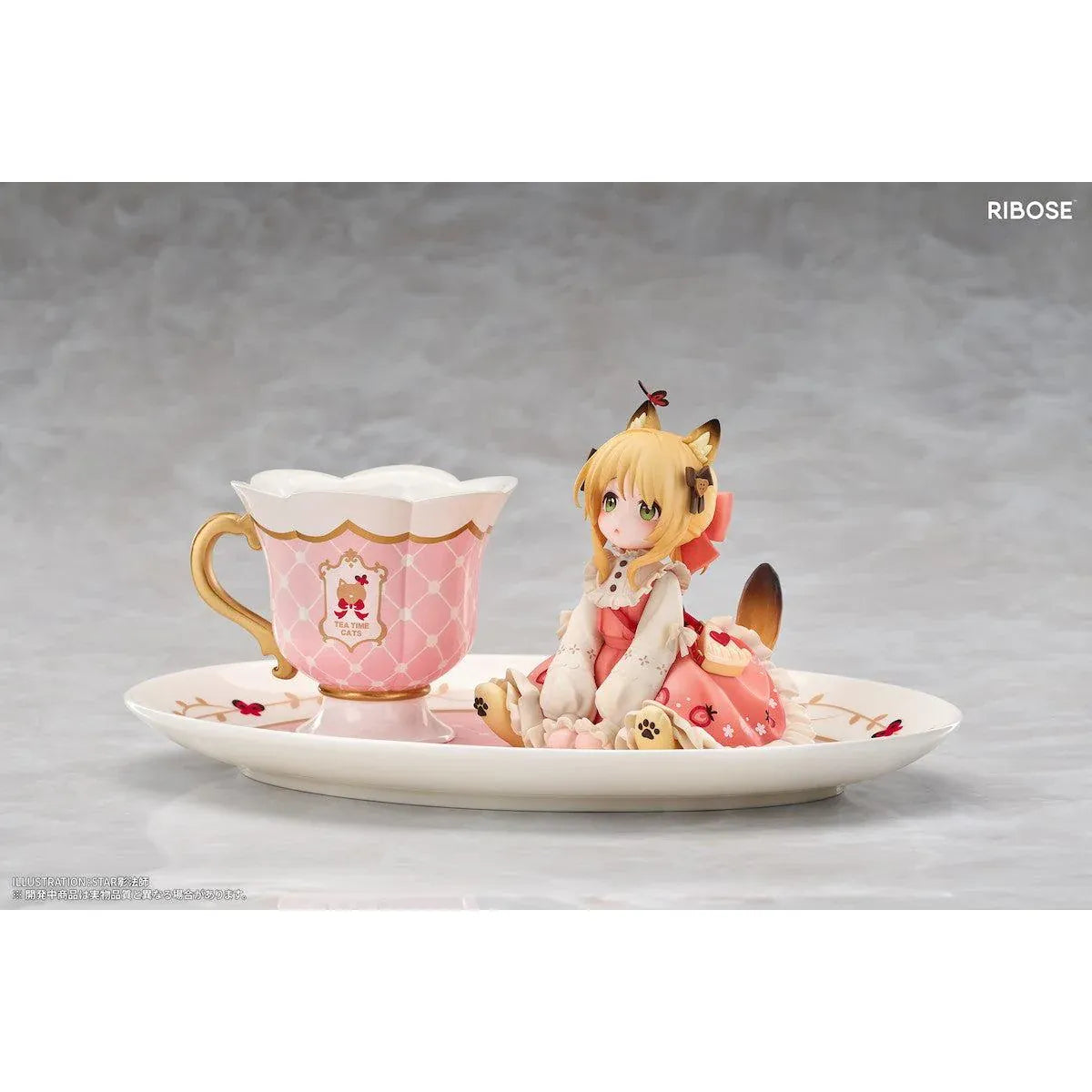 DLC Series Tea Time Cats Orange Cat Non Scale Figure by RIBOSE featuring an orange-haired cat girl with green eyes, a pink outfit, fluffy cat ears, and paw-shaped sleeves sitting beside a decorative pink teacup on a matching serving tray.