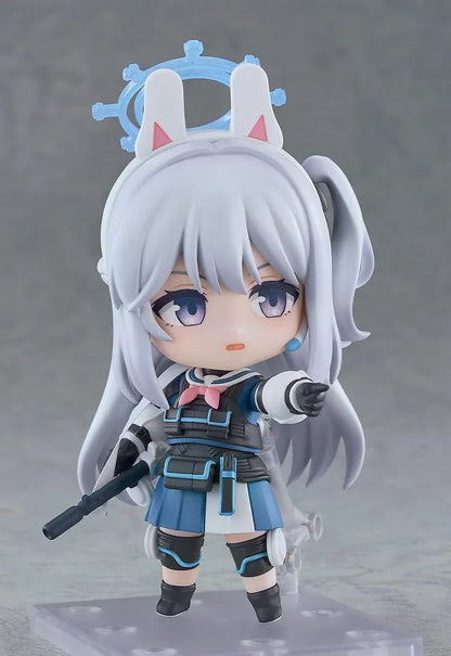 Blue Archive Nendoroid Miyako Tsukiyuki with silver hair, rabbit-ear headband, blue halo, white jacket, blue skirt, and black tactical gear.