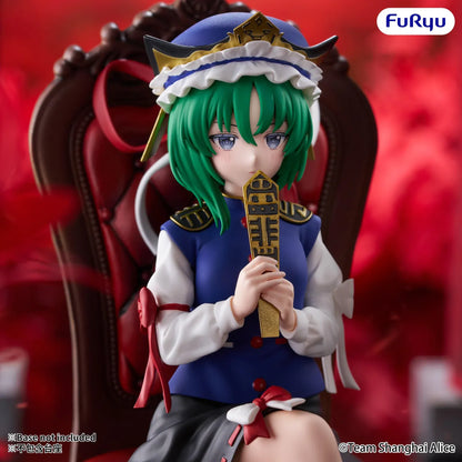 Shiki Eiki Yamaxanadu Noodle Stopper figure seated with crossed legs, green hair, a blue-and-white outfit, and a golden Rod of Remorse.