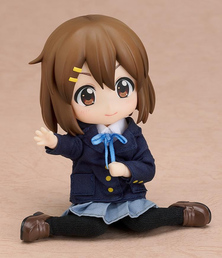 K-ON Nendoroid Doll Yui Hirasawa wearing her Sakuragaoka High School uniform with navy blazer, pleated skirt, and blue ribbon
