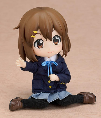 K-ON Nendoroid Doll Yui Hirasawa wearing her Sakuragaoka High School uniform with navy blazer, pleated skirt, and blue ribbon