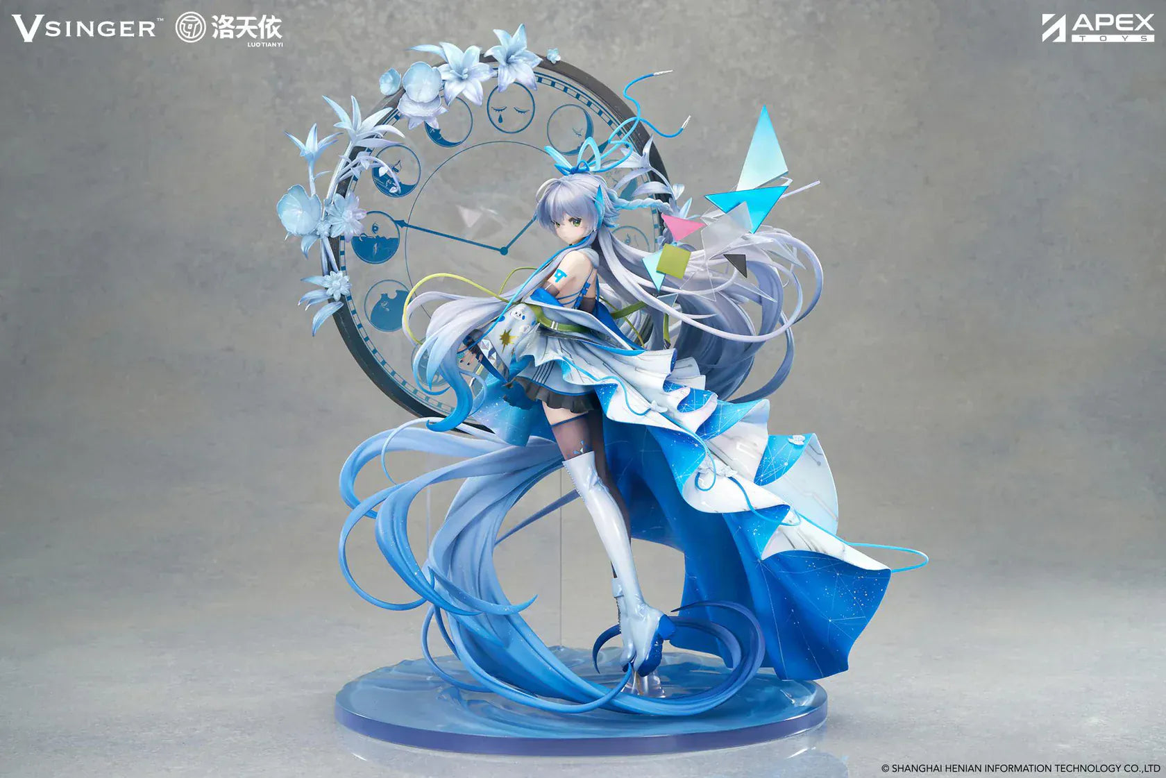 Vsinger Luo Tianyi 12th Anniversary 1/7 scale figure featuring flowing twin tails, layered blue and white dress, and ornate circular backdrop