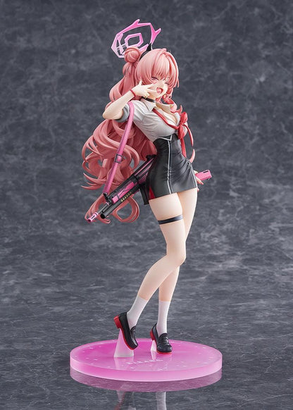 Blue Archive Kirara 1/7 scale figure with long pink hair, school uniform, pink and black weapon, halo, and translucent pink display base