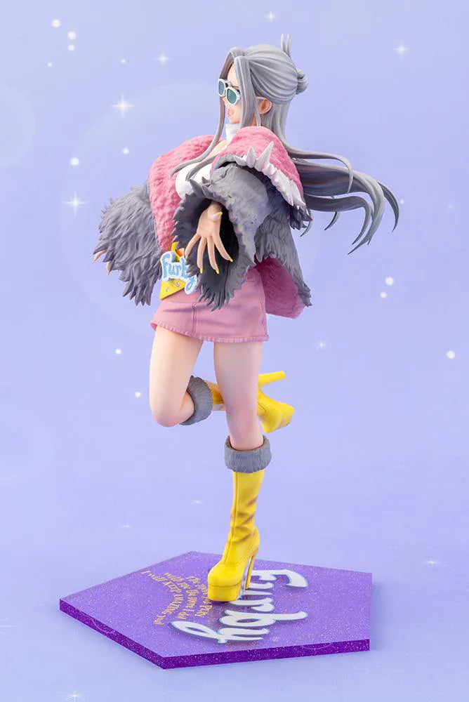 Furby Bishoujo Figure with fashionable character in sunglasses, fuzzy jacket, yellow boots, Furby companion, and glittery display base