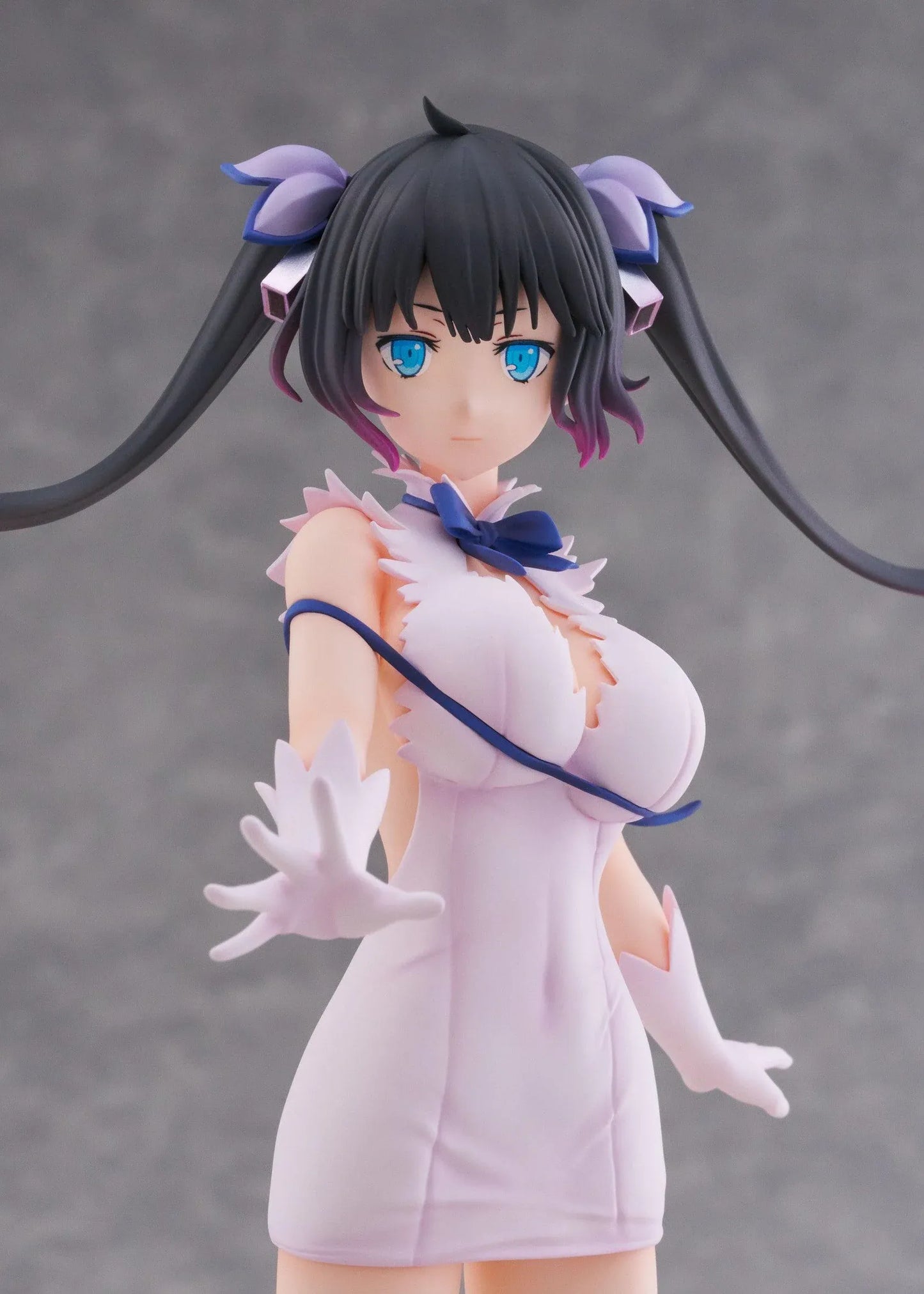 Is It Wrong to Try to Pick Up Girls in a Dungeon V Hestia Divinity Unleashed Limited Edition Ver. 1/7 Scale Figure with twin-tails, white outfit, blue ribbon accents, rocky base, and flame effect parts