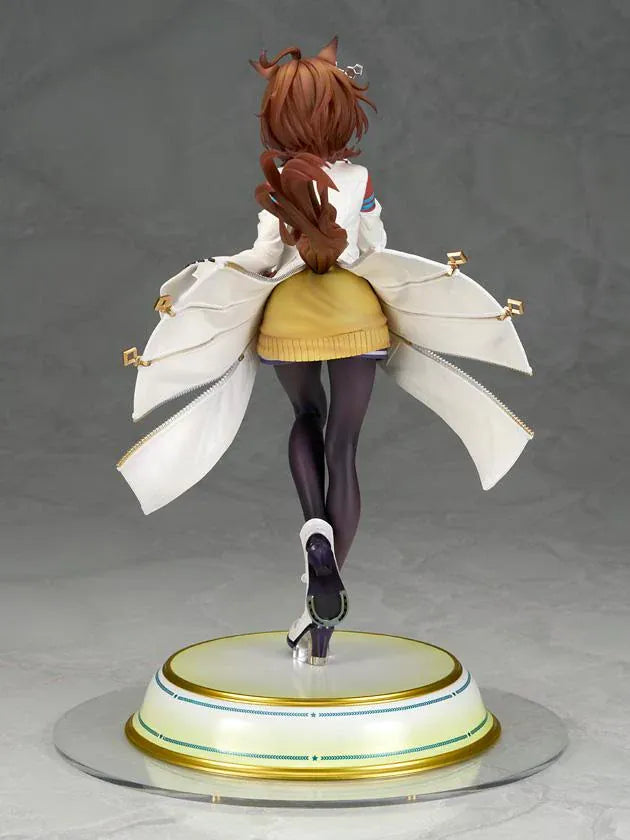 Agnes Tachyon 1/7 scale figure wearing an oversized white laboratory coat, yellow sweater, and dark tights on a decorative base.