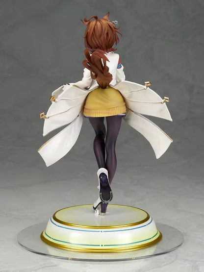 Agnes Tachyon 1/7 scale figure wearing an oversized white laboratory coat, yellow sweater, and dark tights on a decorative base.