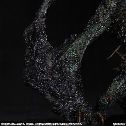 Monster Hunter Gogmazios Creator's Model XL figure roaring with dark textured scales, jagged spines, large claws, and red-orange chest accents.