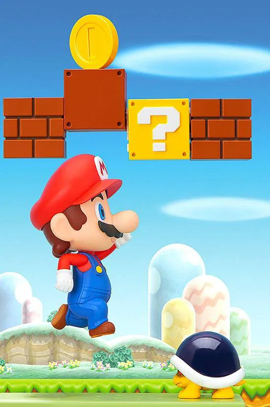 Super Mario Nendoroid Mario figure wearing his red hat and blue overalls in a running pose