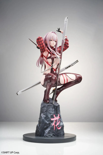 Scarlet Racer's High scale figure from Goddess of Victory: Nikke, crouching on a rocky base with weapons drawn and glossy red combat suit.