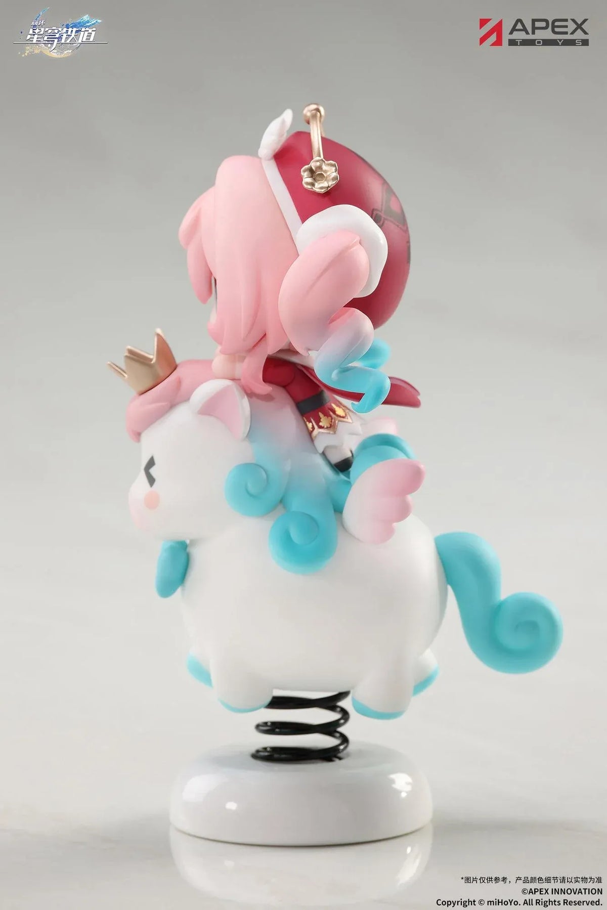 Honkai Star Rail Happy Shake Hyacine Non-Scale Figure by APEX Toys featuring a pink-haired anime girl with turquoise eyes riding a white winged companion with a golden crown and blue bow, mounted on a black spring and white circular base.