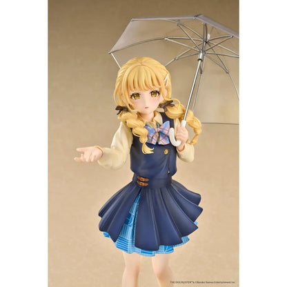 Gakuen iDOLM@STER Kotone Fujita Ameagari no Iris Before Special Training Ver. 1/7 Scale Figure featuring a blonde-haired anime girl with twin braids wearing a navy-blue school uniform and holding a transparent umbrella on a yellow display base.
