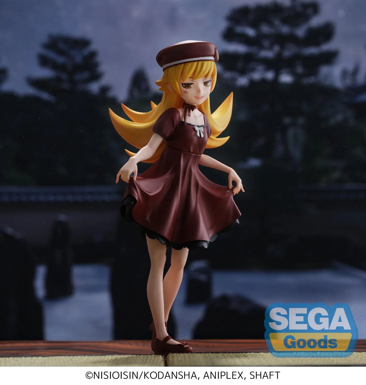 Monogatari High Premium Figure Shinobu Oshino Figure wearing a burgundy dress and hat with golden hair