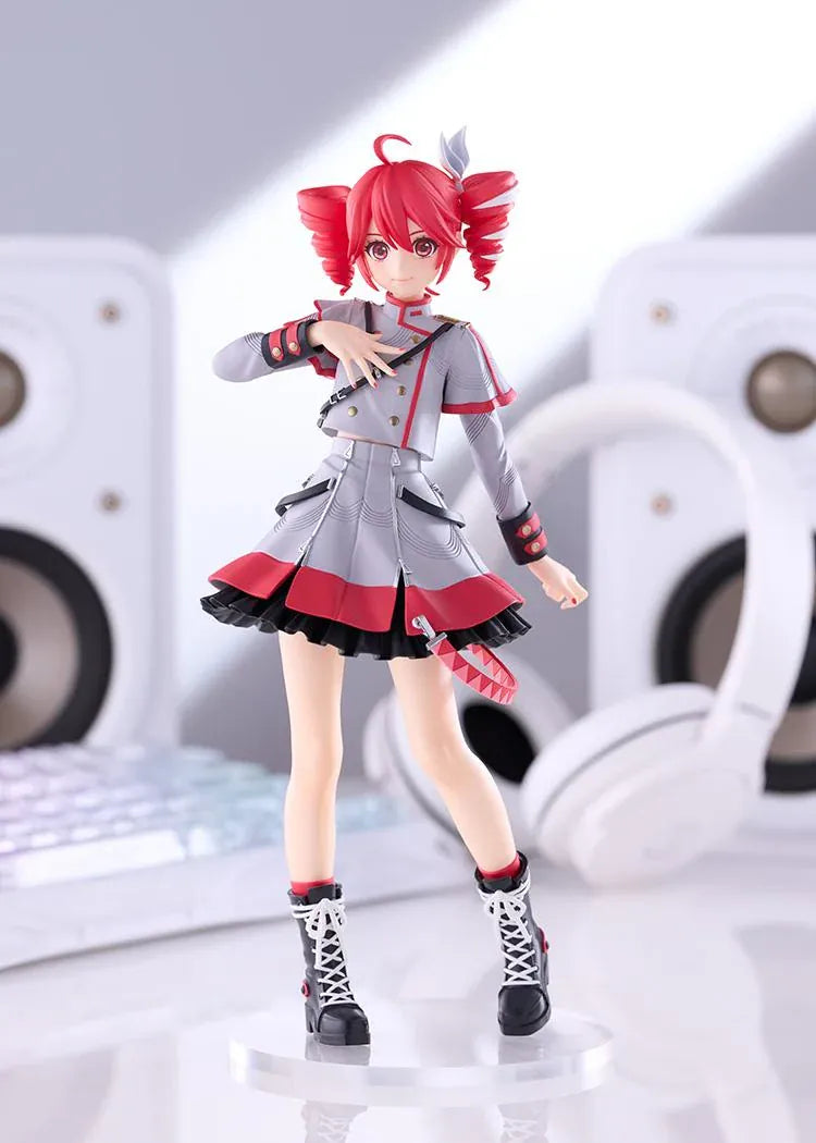Kasane Teto Synthesizer V AI figure with red drill curls, a gray and red outfit, layered skirt, and black lace-up boots, posed with one hand across her chest.