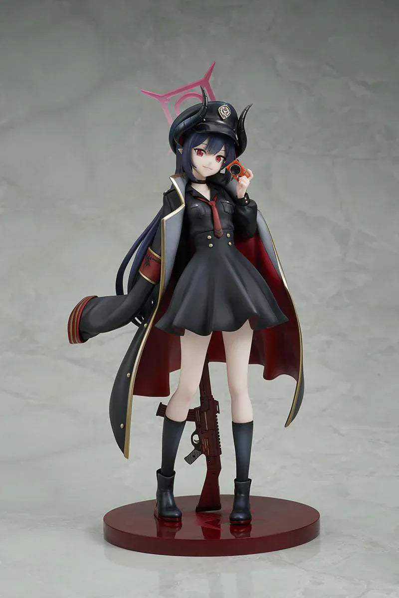 Blue Archive Chiaki 1/7 scale figure wearing dark uniform with long coat holding camera and rifle accessory.