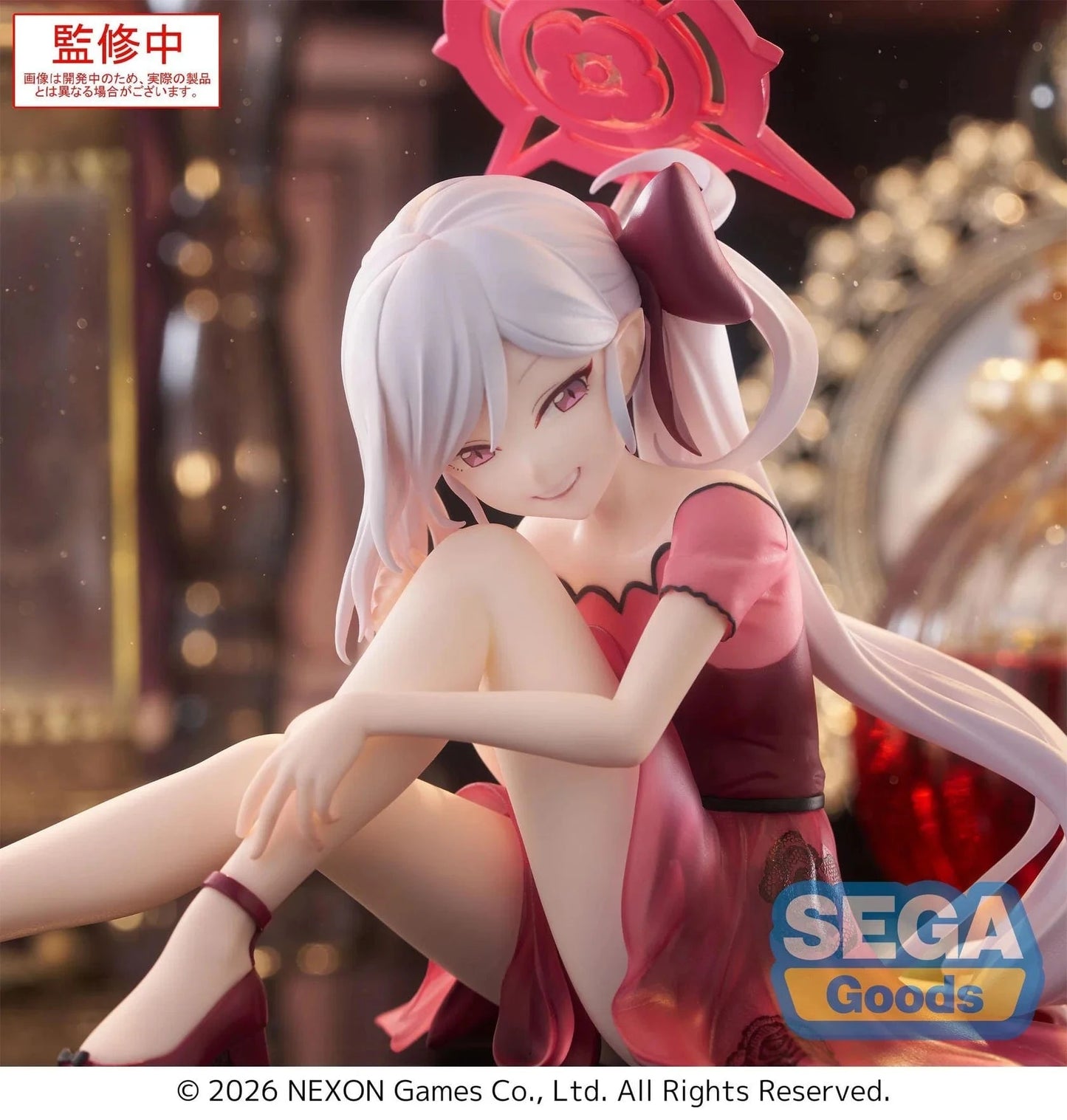 Blue Archive Yumemirize Mutsuki figure sitting in red dress with silver hair and playful expression