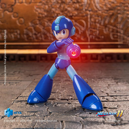 Mega Man Original Series action figure by Hiya Toys with interchangeable faces, hands, Mega Buster, charged-shot effect, and clear display stand.