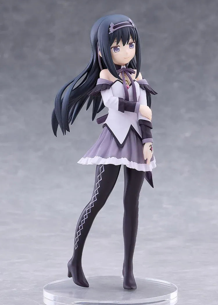 Homura Akemi figure with long black hair, violet eyes, a white and purple outfit, and diamond-patterned stockings, smiling with one hand resting on her arm.