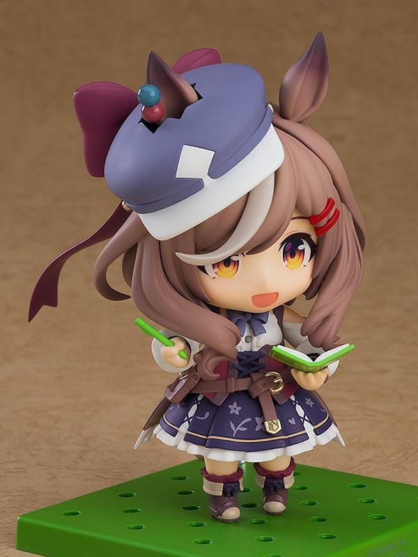 Umamusume Pretty Derby Nendoroid Matikanetannhauser Figure Rerelease featuring Matikanetannhauser with horse ears, brown hair, signature hat, race-inspired outfit, and cheerful pointing pose.