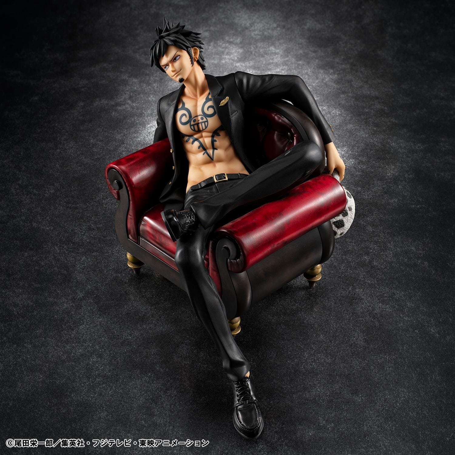 One Piece Portrait Of Pirates S.O.C. Trafalgar Law Ver. R Figure wearing a black suit and sitting in a red armchair