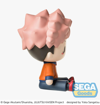 Yuji Itadori chibi figure in a seated pose with pink hair, facial markings, and an orange and navy outfit.