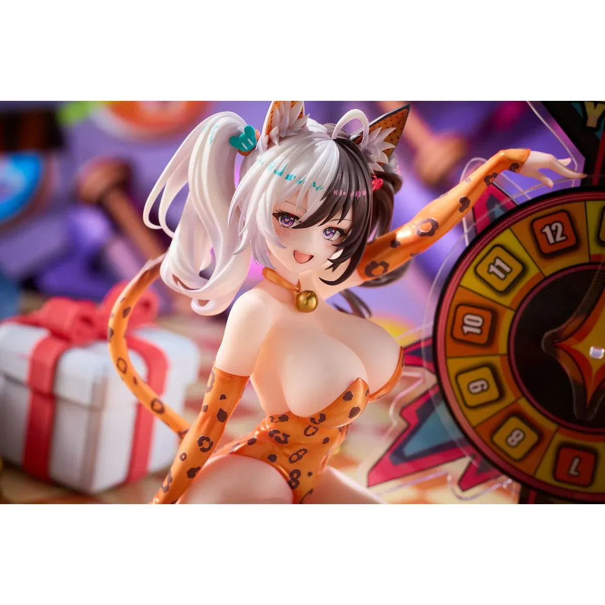Astral Party Nancy Lu Special Edition 1/6 Scale Figure featuring a black and white-haired anime girl with purple eyes wearing an orange leopard-print bodysuit, animal ears, and a spotted tail, posed beside a colorful roulette wheel with matching illustrated bonuses.