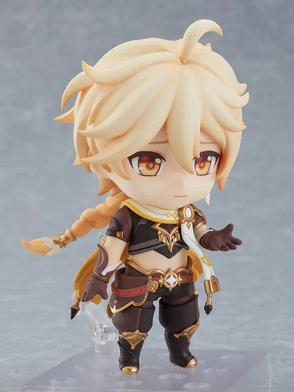 Genshin Impact Nendoroid Traveler Figure Aether Rerelease featuring Aether with blonde hair, golden eyes, fantasy outfit details, yellow cape, and sword accessory.