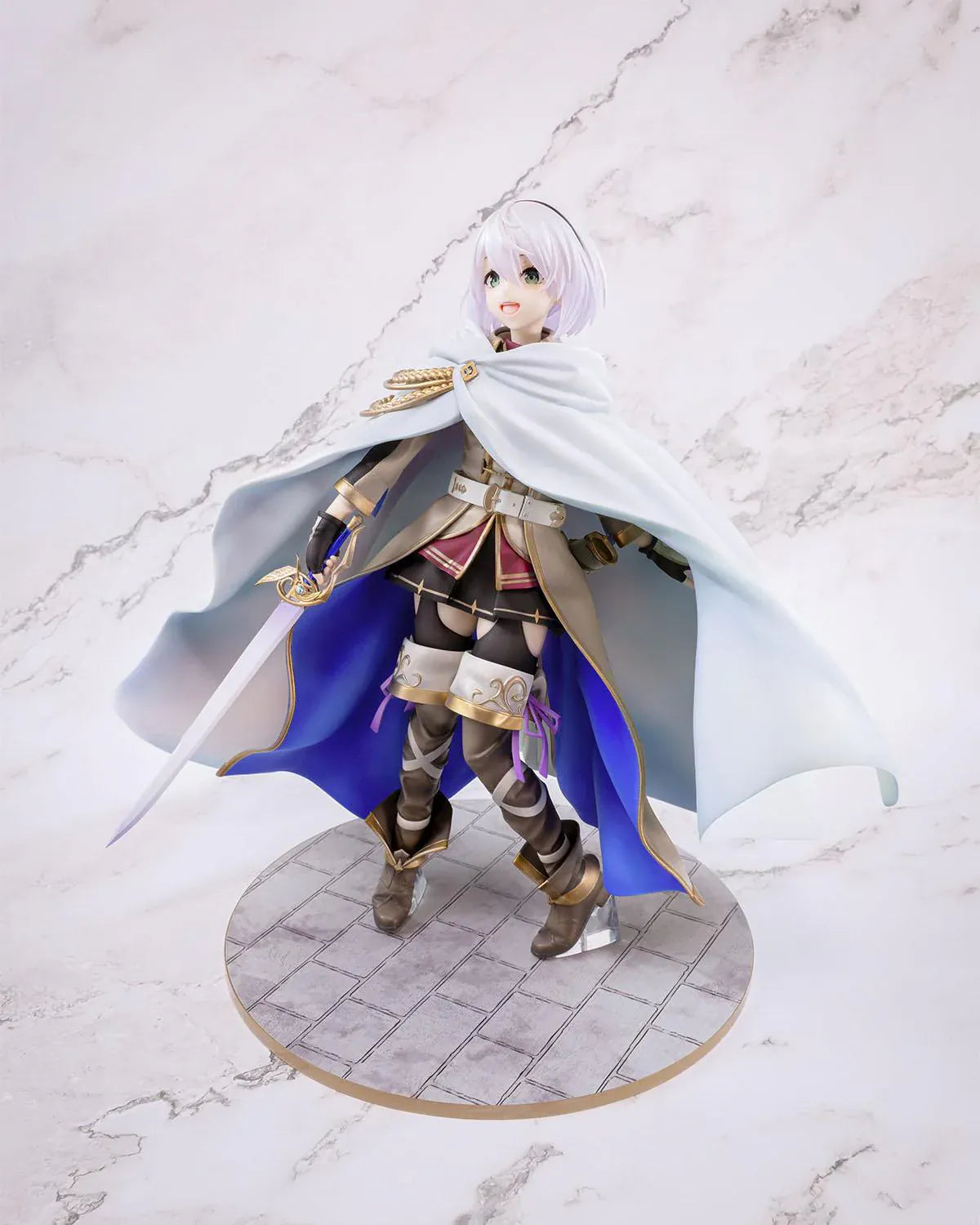 Wandering Witch The Journey of Elaina Amnesia 1/7 Scale Figure featuring Amnesia with short silver hair, white cape, sword, and stone-style display base.
