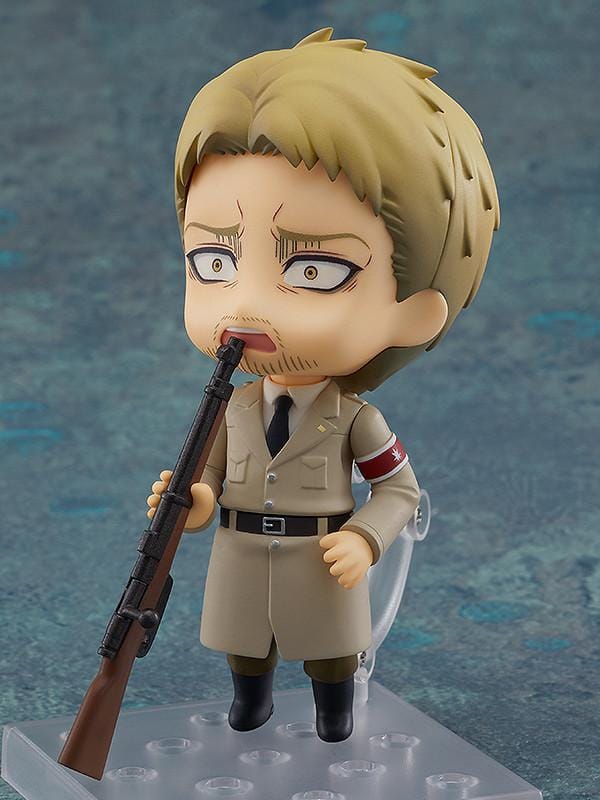 Attack on Titan Nendoroid Reiner Braun rerelease figure with blonde hair, facial stubble, crossed arms, and a tan Marleyan uniform.