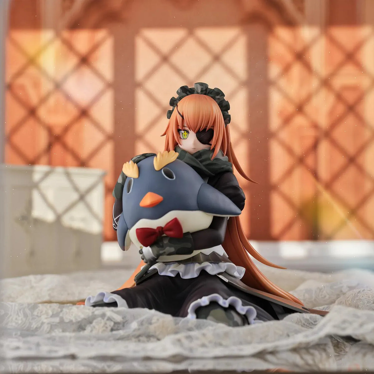 Overlord CZ2128 Delta 1/6 scale figure wearing her camouflage maid uniform and eyepatch while seated with a large penguin plush.