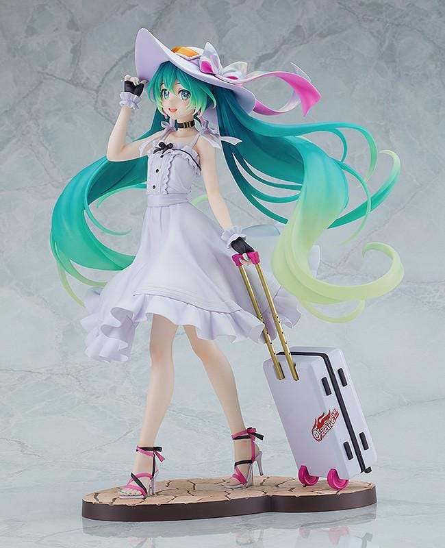Racing Miku 2021 Private Ver. figure in a white dress and wide-brimmed hat, with turquoise twin-tails and a rolling suitcase on a stone-style base.