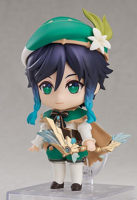 Genshin Impact Nendoroid Venti Figure Rerelease featuring Venti with green outfit, bard hat, braided teal hair accents, winking expression, and lyre accessory.