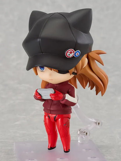 Rebuild of Evangelion Nendoroid Asuka Shikinami Langley Jersey Ver. Figure featuring Asuka in a chibi-style design with orange hair, black cat-ear cap, red jersey outfit, and eyepatch detail.