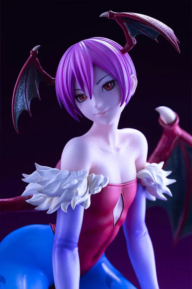 Darkstalkers Lilith 1/7 Scale Figure featuring Lilith with purple hair, bat wing accents, red-and-blue outfit details, and a playful seated pose.