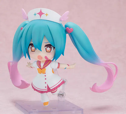 Hatsune Miku Nendoroid MAGICAL CURE LOVE SHOT Figure with teal pink twin-tails, magical nurse outfit, heart details, and starry eyes