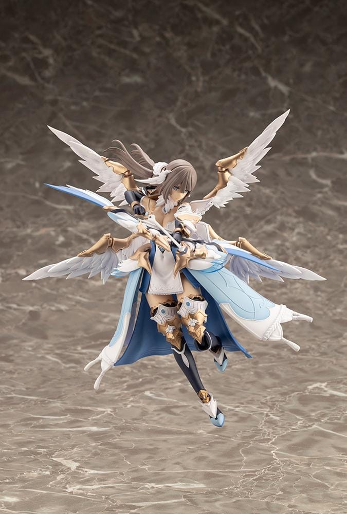 Assembled Arcanadea Ermeda model kit with long brown hair, white feathered wings, a blue and white outfit, gold armor accents, and armored boots.