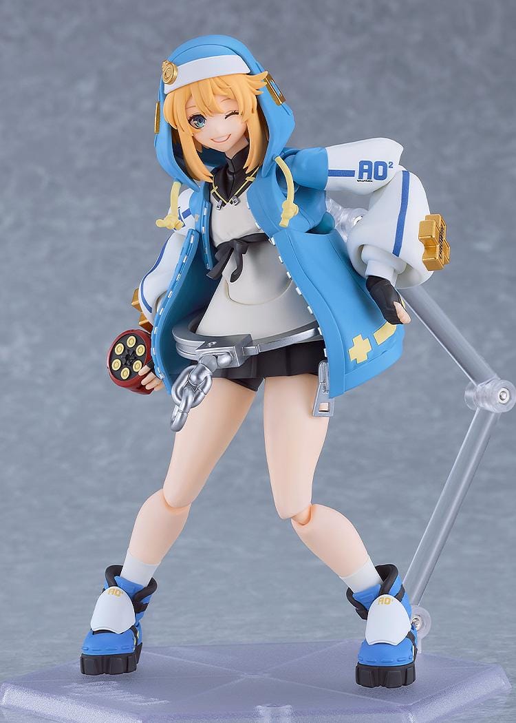 GUILTY GEAR STRIVE figma Bridget Figure featuring Bridget in a blue hoodie outfit with yo-yo accessory, oversized handcuff detail, and teddy bear companion.