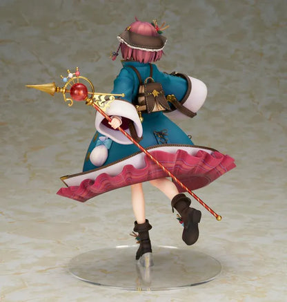 Sophie Neuenmuller figure smiling in a dynamic pose, wearing a teal coat over a red outfit and holding an ornate gold staff with a red orb.