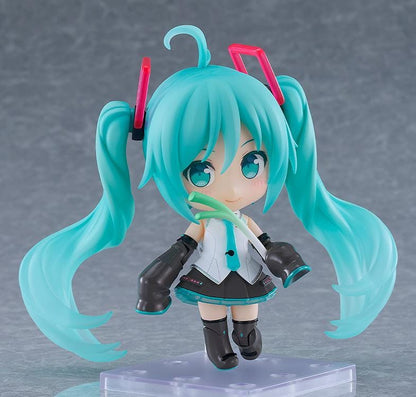 Hatsune Miku Nendoroid Hatsune Miku HMO Ver. Figure featuring Miku with teal twin tails, red glasses, colorful cable-style hair accessories, and music-inspired outfit details.