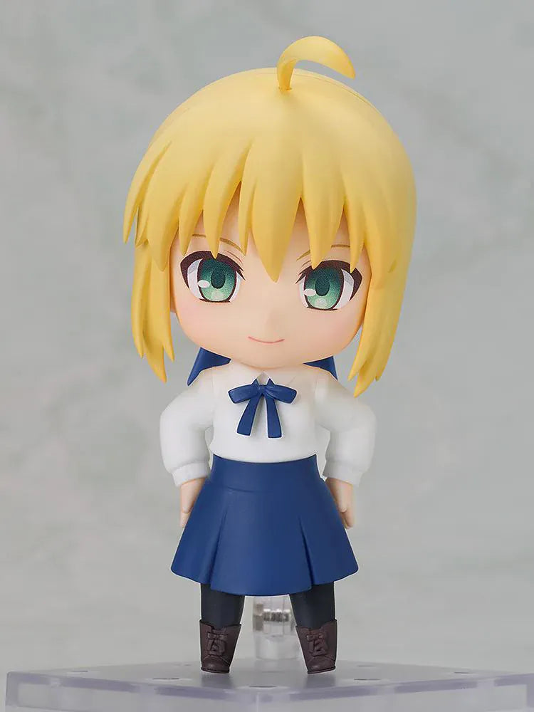 Fate stay night Nendoroid Saber Casual Outfit Ver. Figure featuring Saber with blonde hair, green eyes, white blouse, blue skirt, and sword accessory.