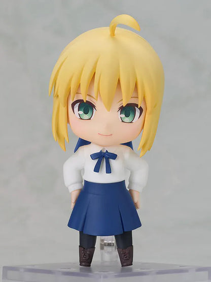 Fate stay night Nendoroid Saber Casual Outfit Ver. Figure featuring Saber with blonde hair, green eyes, white blouse, blue skirt, and sword accessory.