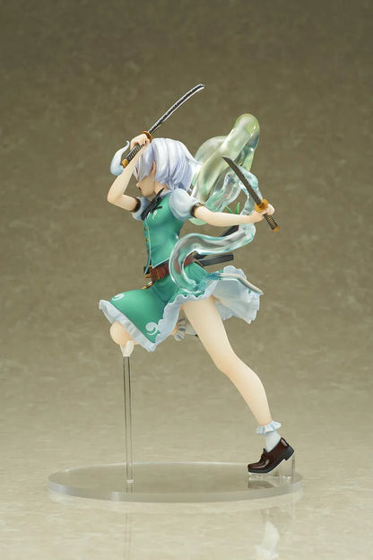Touhou Project Youmu Konpaku figure wielding two swords in an airborne pose, wearing a green outfit with a translucent swirling spirit effect.