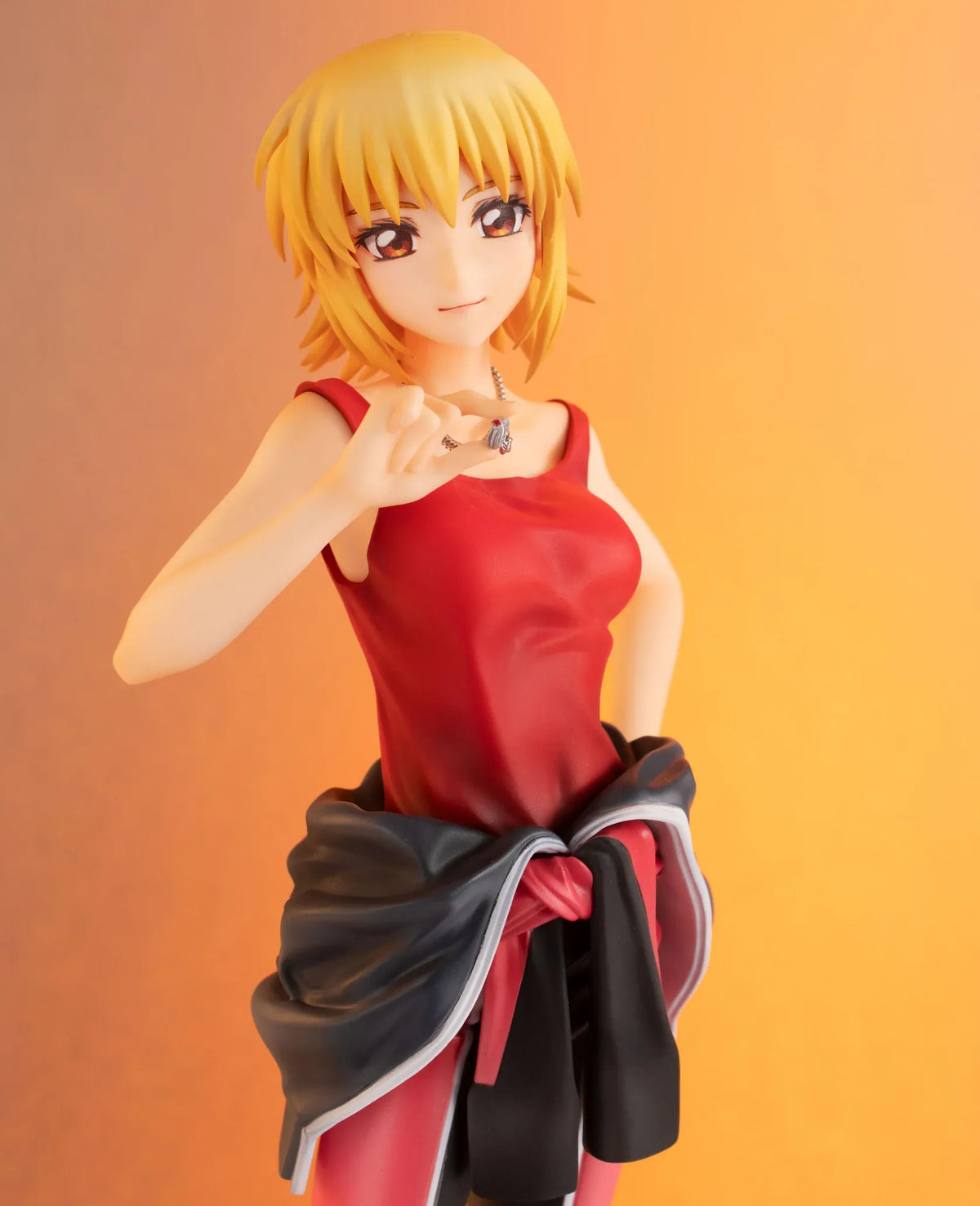 Gundam Girls Generation Cagalli Yula Athha Pilot Suit Ver. figure wearing a red-and-black pilot suit with her jacket tied around her waist.