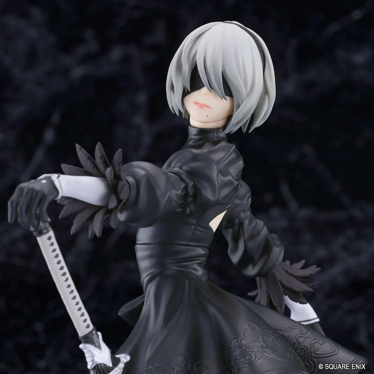 NieR POP UP PARADE 2B YoRHa No.2 Type B L Size Figure featuring a silver-white-haired android wearing a black gothic combat dress, thigh-high boots, and black gloves while holding a large sword on a circular display base.