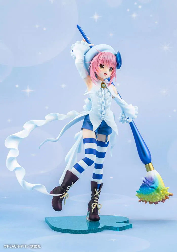 Amulet Spade 1/7 scale figure with pink hair, a white-and-blue costume, striped stockings, and an oversized rainbow-tipped paintbrush.