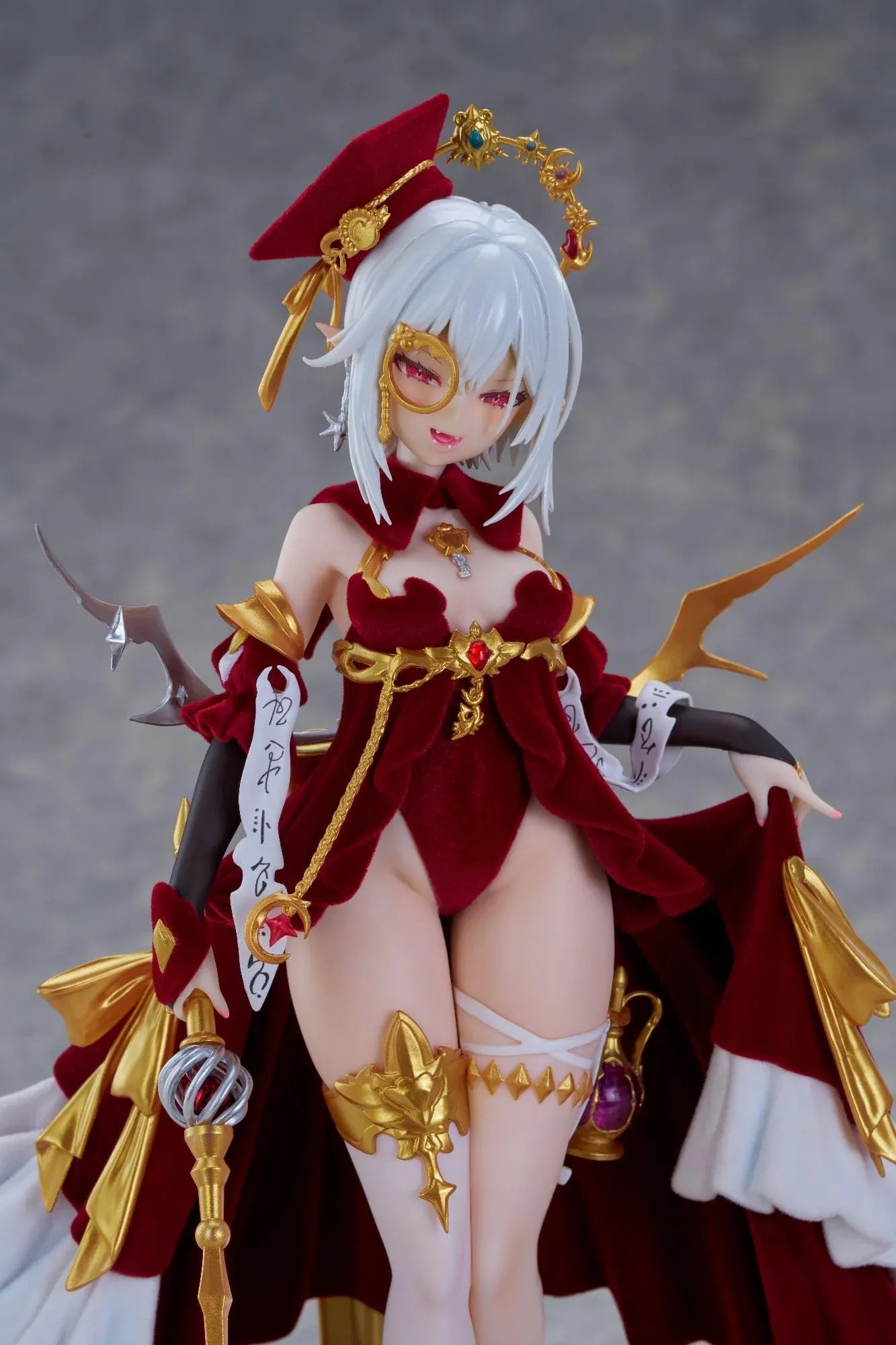 Alchemist Formal Dress Ver. 1/7 Scale Figure featuring a white-haired character in a red formal dress with gold accessories, ornate staff, cape, and red display base.