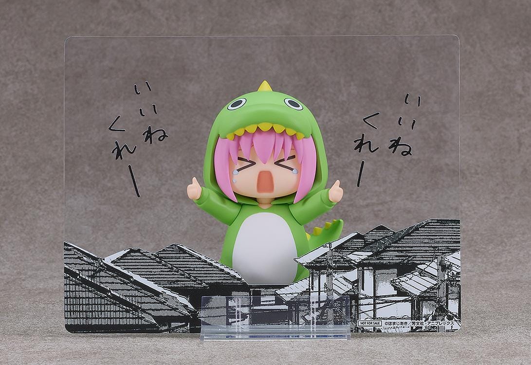 Hitori Gotoh Attention-Seeking Monster Ver. Nendoroid wearing a green monster outfit with yellow spikes, pink hair, and a tearful expression.