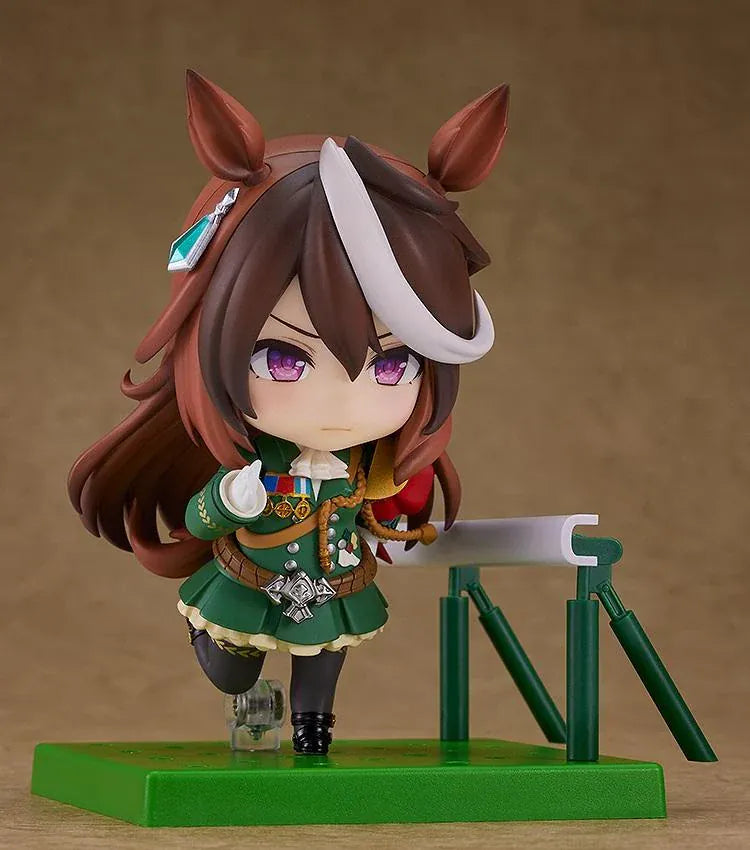Umamusume Pretty Derby Nendoroid Symboli Rudolf Figure (Rerelease) featuring a brown-haired horse girl with a white forelock, purple eyes, green academy uniform, gold decorations, red cape, and black boots.