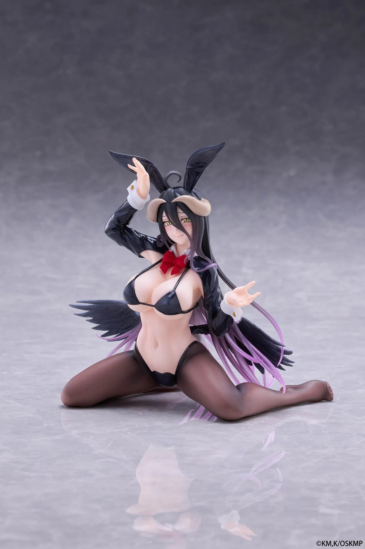 Albedo MOFLOCK Reverse Bunny Suit figure wearing a glossy black outfit with bunny ears, sheer stockings, horns, and black wings.