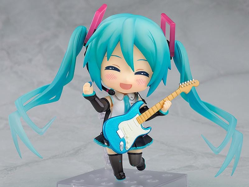 Hatsune Miku Nendoroid Hatsune Miku V4X Figure Rerelease with turquoise twin tails, headset, and black white teal Vocaloid outfit